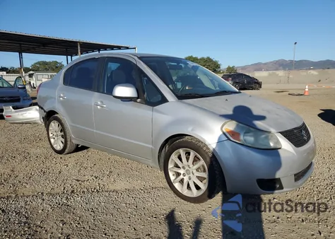 2011 Suzuki Sx4 Le z USA, uszkodzony, nr VIN JS2YC5A24B6301884